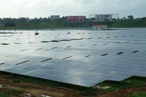 "Solar cells near cargo terminal" by Binu jayakrishnan - Own work. Licensed under CC BY-SA 3.0 via Commons.